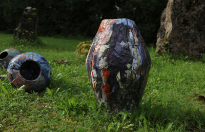 &ldquo;Unknown Artist from Salaspils&rdquo; Instalation view, glazed vases&nbsp; Due to its strategically advantageous location, Salaspils and its inhabitants have frequently and heavily suffered from ongoing wars. What would have been the history of Salaspils and the people of Salaspils in the 14th - 17th centuries if they lived in more peaceful&nbsp;times? Would it have affected local art? There is not much archaeological evidence for this period, but it is presumed that the local artists continued to draw ornaments, as in earlier periods. In search of an alternative history where Salaspils inhabitants, despite historical conditions, have been able to sometimes express themselves in art, excavations led by archaeologist A. Dimina were carried out. In the vicinity of Salaskalns estate (present-day Saulkalne town area), well-preserved vases and pots were found dating from the 14th&ndash;17th centuries. Examination of the dishes shows that they are made of local clay and painted with glazes probably bought from the Germans. The theme of the dishes indicates the cult of animalism in the territory of Latvia. The rendering of human figures in static poses is also characteristic of the art of the time elsewhere in the Baltic Sea basin.