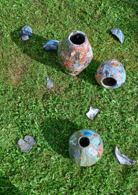 &ldquo;Unknown Artist from Salaspils&rdquo; Instalation view, glazed vases&nbsp; Due to its strategically advantageous location, Salaspils and its inhabitants have frequently and heavily suffered from ongoing wars. What would have been the history of Salaspils and the people of Salaspils in the 14th - 17th centuries if they lived in more peaceful&nbsp;times? Would it have affected local art? There is not much archaeological evidence for this period, but it is presumed that the local artists continued to draw ornaments, as in earlier periods. In search of an alternative history where Salaspils inhabitants, despite historical conditions, have been able to sometimes express themselves in art, excavations led by archaeologist A. Dimina were carried out. In the vicinity of Salaskalns estate (present-day Saulkalne town area), well-preserved vases and pots were found dating from the 14th&ndash;17th centuries. Examination of the dishes shows that they are made of local clay and painted with glazes probably bought from the Germans. The theme of the dishes indicates the cult of animalism in the territory of Latvia. The rendering of human figures in static poses is also characteristic of the art of the time elsewhere in the Baltic Sea basin.