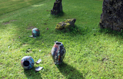 &ldquo;Unknown Artist from Salaspils&rdquo; Instalation view, glazed vases&nbsp; Due to its strategically advantageous location, Salaspils and its inhabitants have frequently and heavily suffered from ongoing wars. What would have been the history of Salaspils and the people of Salaspils in the 14th - 17th centuries if they lived in more peaceful&nbsp;times? Would it have affected local art? There is not much archaeological evidence for this period, but it is presumed that the local artists continued to draw ornaments, as in earlier periods. In search of an alternative history where Salaspils inhabitants, despite historical conditions, have been able to sometimes express themselves in art, excavations led by archaeologist A. Dimina were carried out. In the vicinity of Salaskalns estate (present-day Saulkalne town area), well-preserved vases and pots were found dating from the 14th&ndash;17th centuries. Examination of the dishes shows that they are made of local clay and painted with glazes probably bought from the Germans. The theme of the dishes indicates the cult of animalism in the territory of Latvia. The rendering of human figures in static poses is also characteristic of the art of the time elsewhere in the Baltic Sea basin.